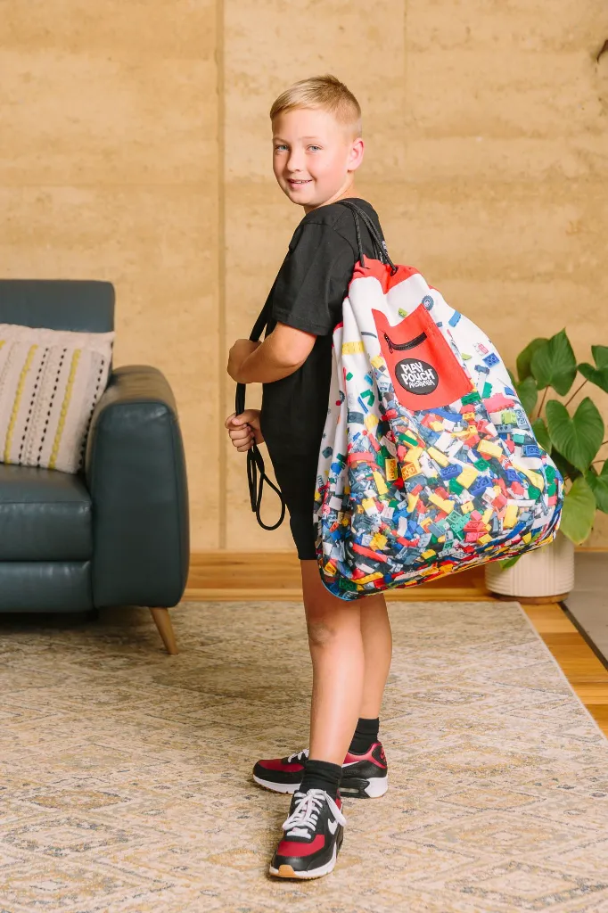 Printed Play Pouch Brick Bag over shoulder foot.webp
